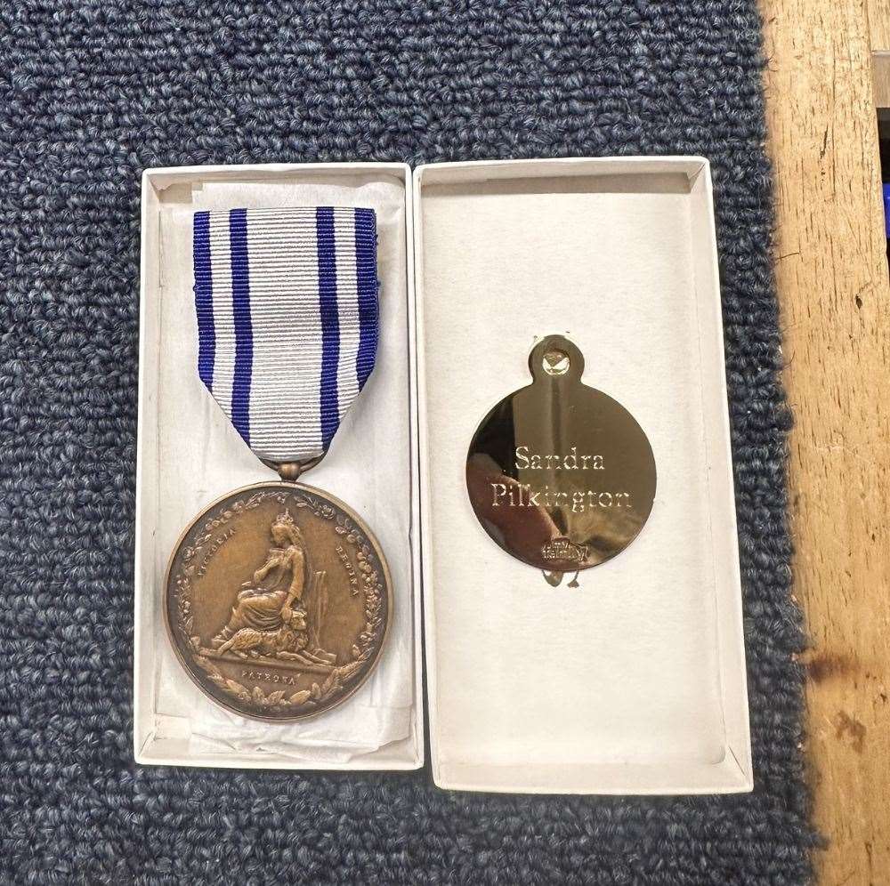 The medal which Sandra Pilkington has received for her dedication to the voluntary role