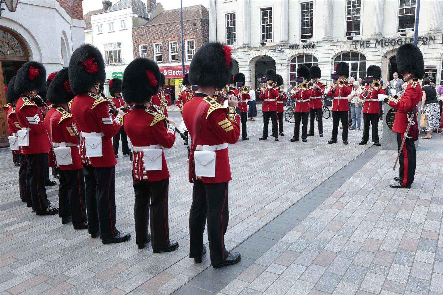 The band take position outside the Town Hall