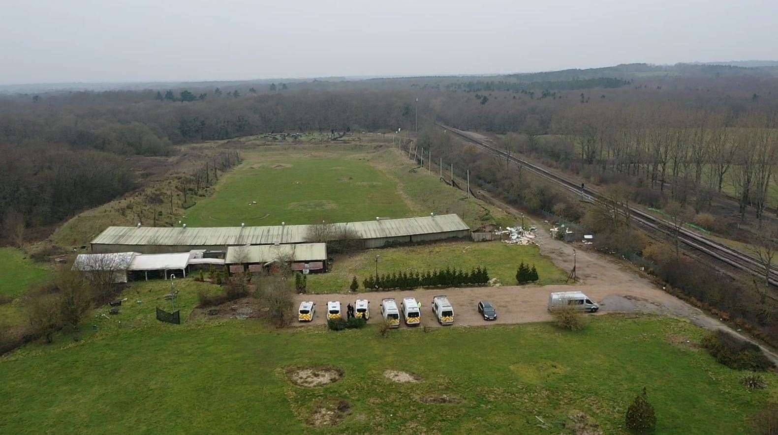 An aerial shot of the Great Chart site taken on Wednesday; the woodland off Fridd Lane is pictured at the back of the complex, behind the former driving range and paintball area. Picture: UKNIP