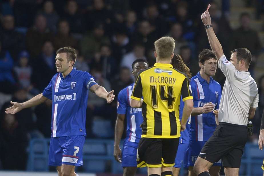 Gills skipper Doug Loft sees red in the 36th minute as the hosts' unbeaten home record came to an end Picture: Barry Goodwin