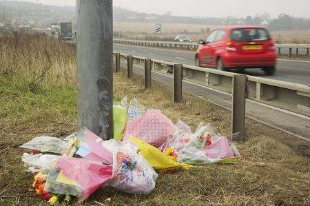 Floral tributes left at the scene of the crash on the A228 at Hoo