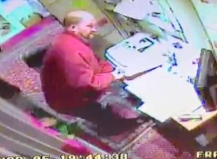 Cctv images show the bald thief pilfering from the till at Elite Hair and Beauty in Orange Street, Canterbury.