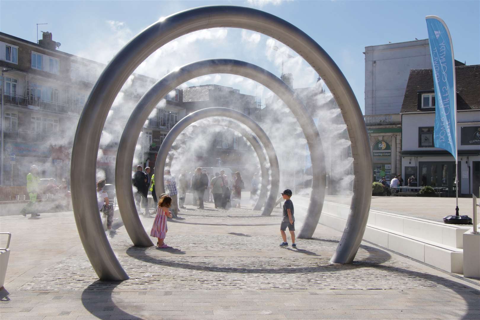 Two children playing in the ringed water feature during the summer. Picture: Dover District Council