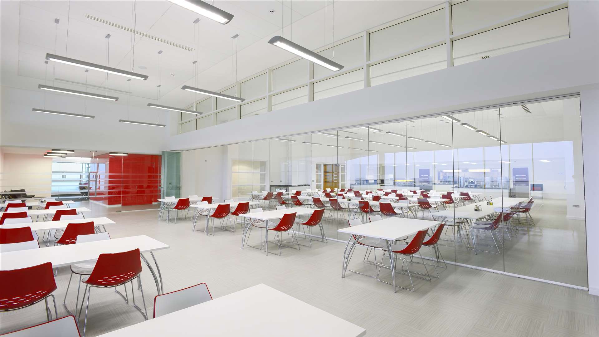 Frameless Glass Curtains installed partitions at Manchester United's Carrington training ground