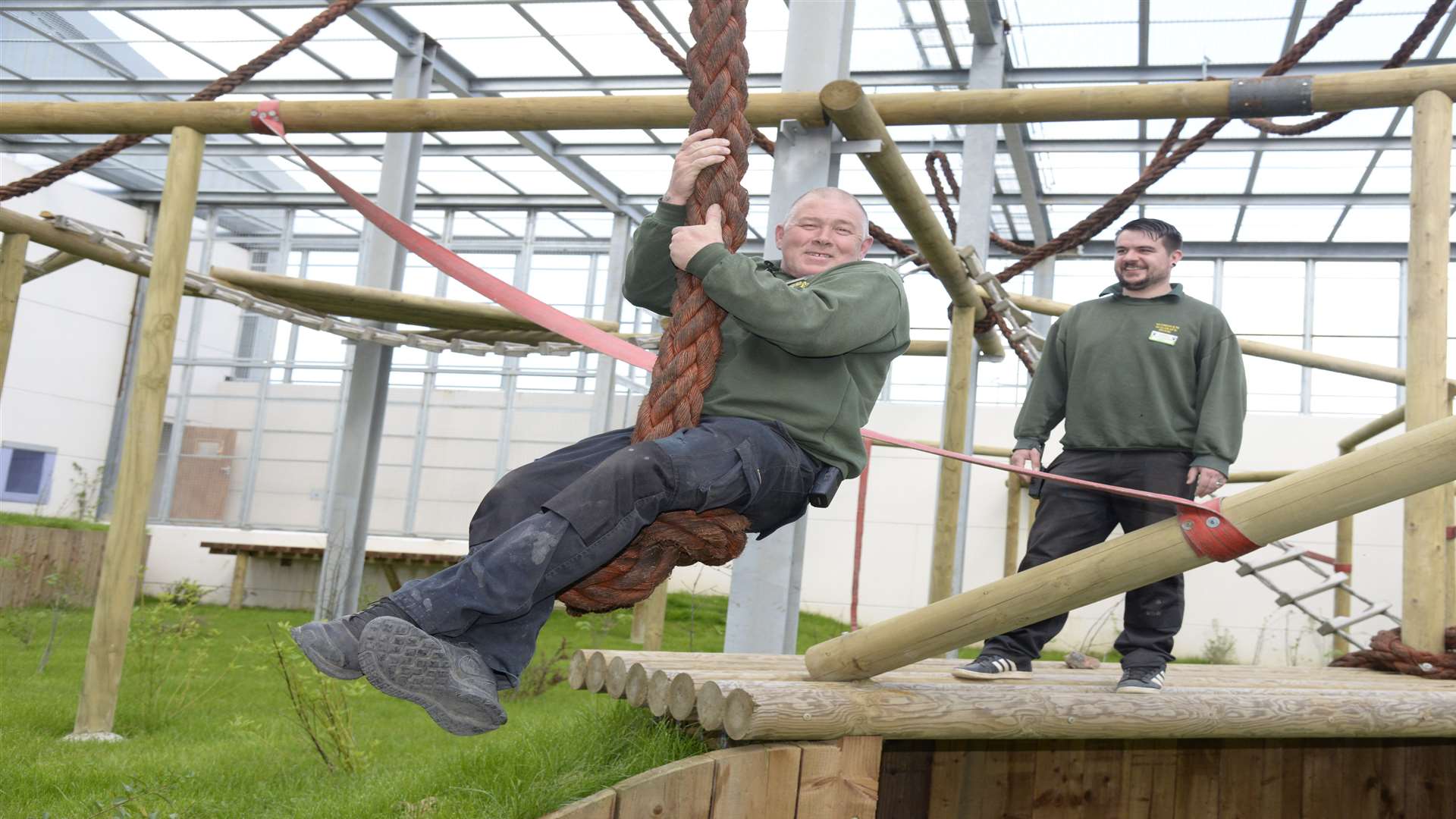 The new chimp enclosure at Wingham Wildlife Park is empty apart from keepers Tony Binskin and Markus Wilder. Picture: Chris Davey