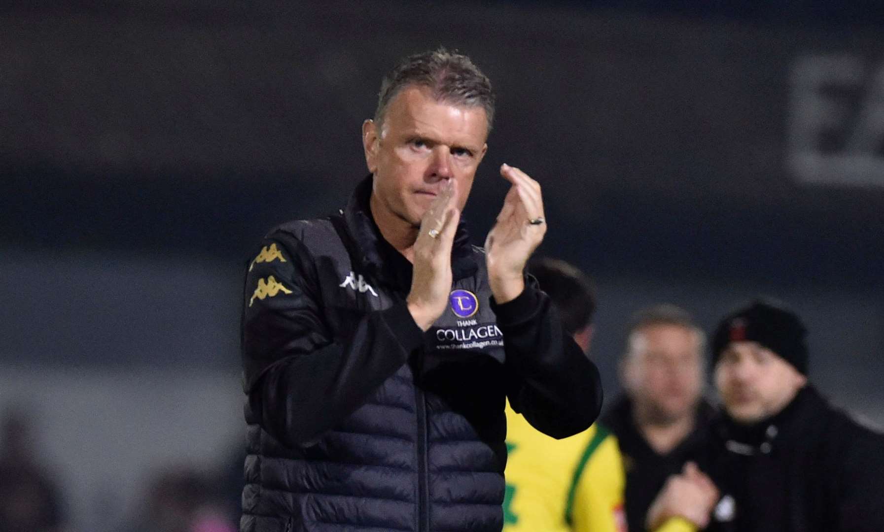 Dejected Faversham boss Tommy Warrilow claps the supporters after again suffering play-off heartache. Picture: Ian Scammell