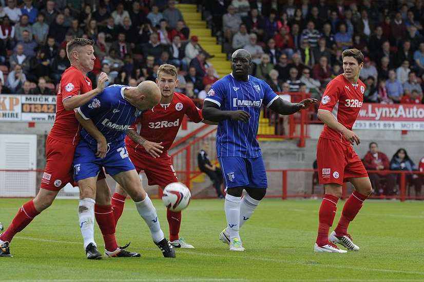 Adam Barrett in the thick of the action against Crawley. Picture: Barry Goodwin