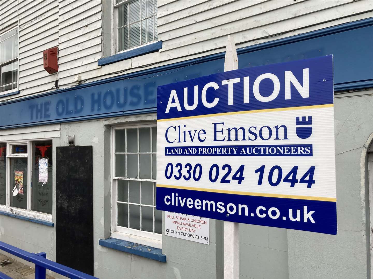 Clive Emson auction sign outside the former Old House at Home pub in Sheerness High Street