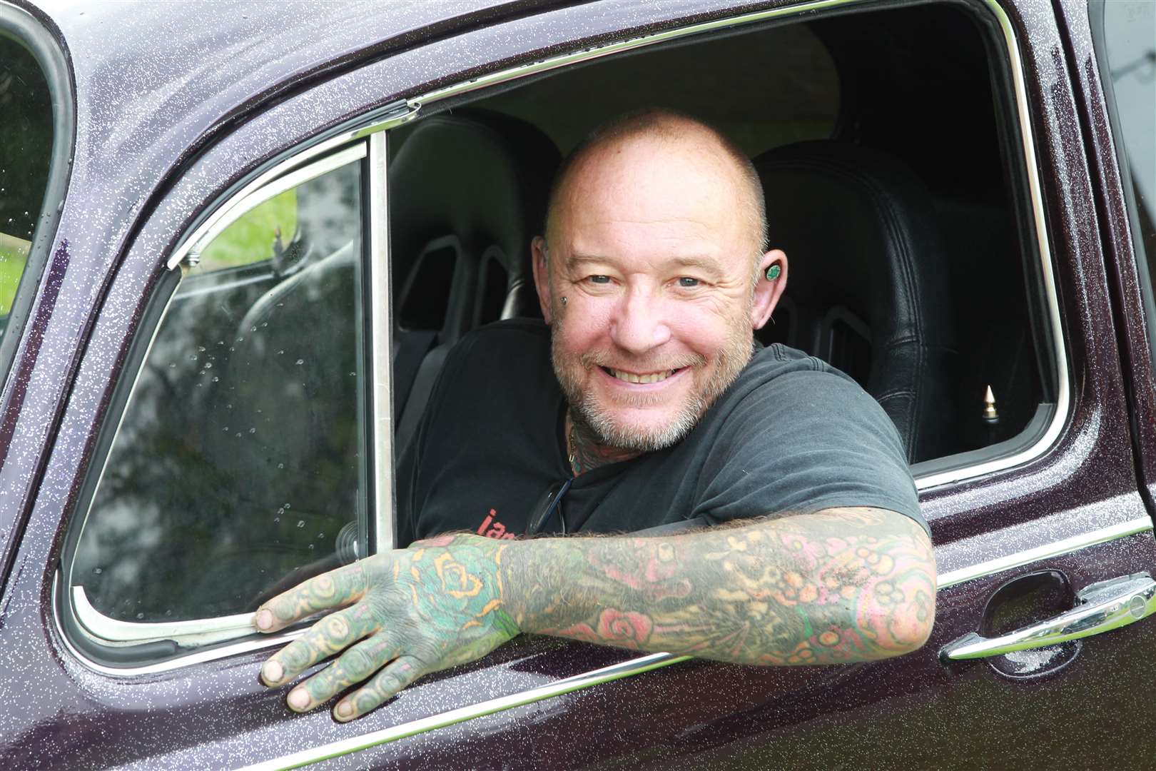 Chris Bramwell with his rebuilt VW Beetle called Firebug. Picture: John Westhrop