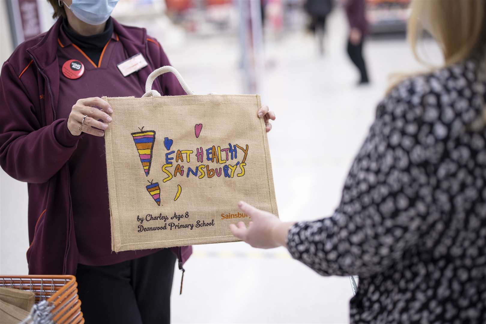 The first 500 shoppers of the store were also gifted a special edition bag designed by eight-year-old Deanwood Primary School student, Charley. Picture: Jason Alden