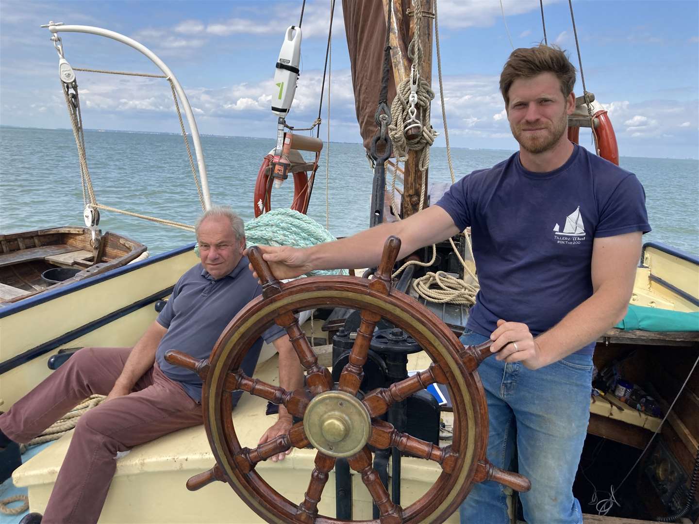 Father and son Geoff and Ed Gransden on the Thames sailing barge the Edith May
