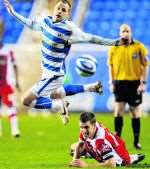 Captain Mark Hudson made sure this Reading attempt at goal went no further. Picture: Barry Goodwin