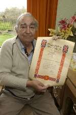 Mr Horace Sage with his certificate celebrating the liberation of Norway