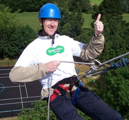 Blair Hunter of Specsavers abseils from the top of the North West Kent College campus, Dartford to support the Lollipop Appeal and Kent Walking Bus.