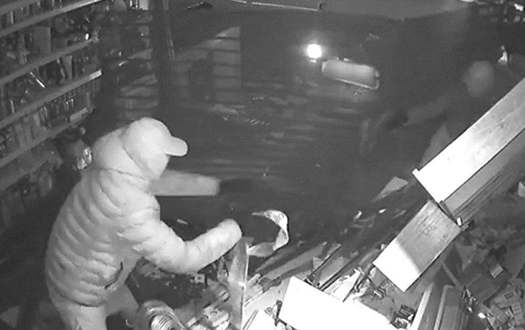 Footage of the moment Searle and Hoadley smashed through the front of Northfleet Food and Wine in the High Street to steal a cash machine. Picture: Kent Police (55388101)