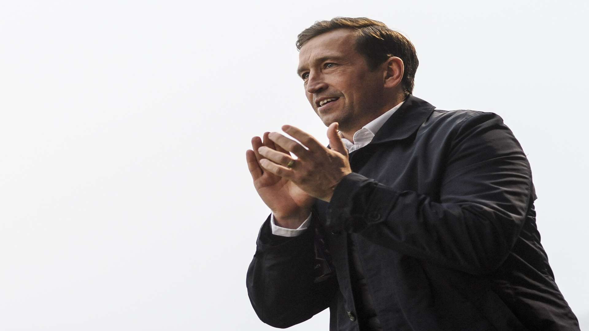 Gillingham manager Justin Edinburgh all smiles on Saturday Picture: Ady Kerry