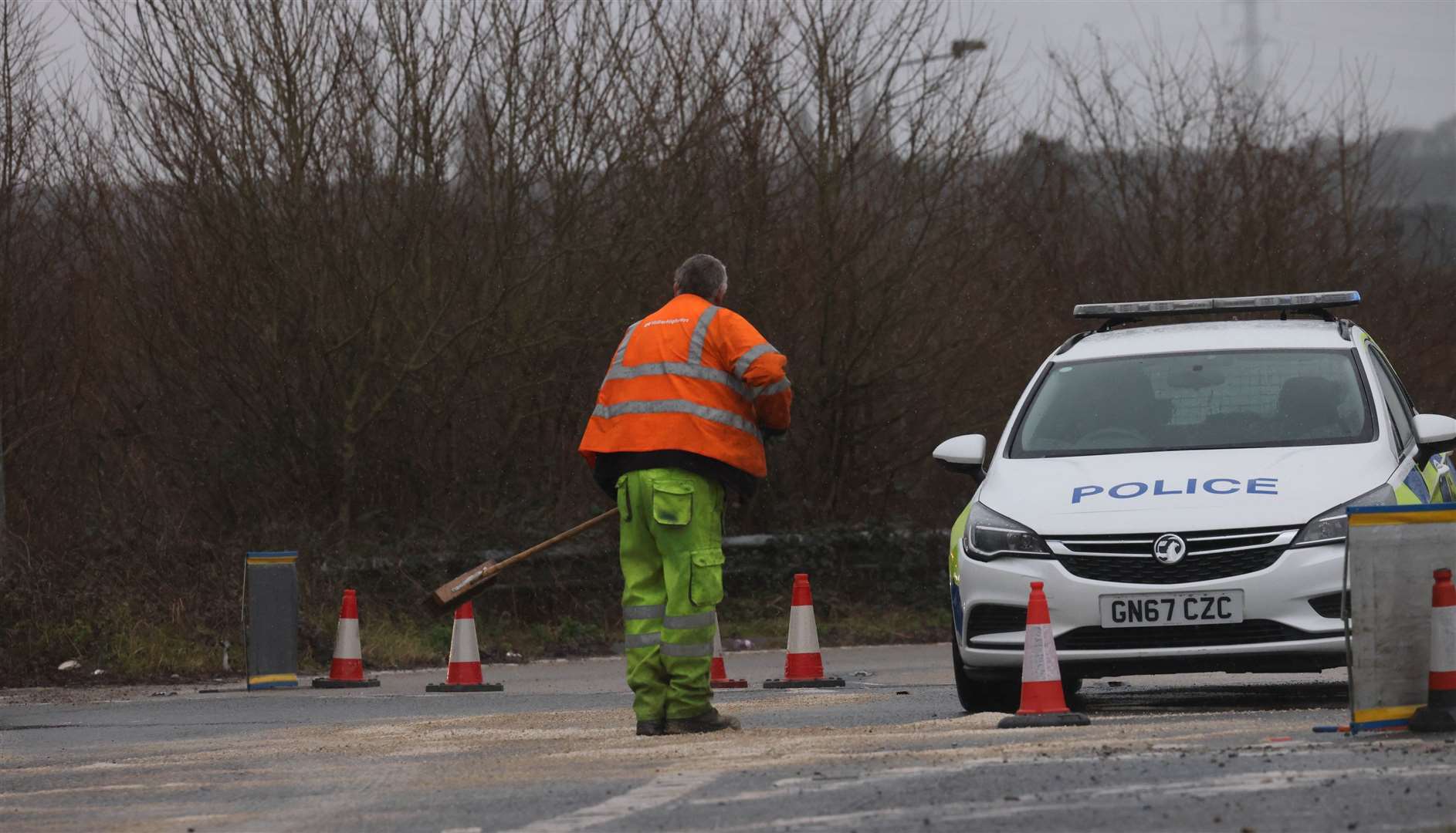 Police have closed the road and work has begun on the clean up. Picture: UKNIP