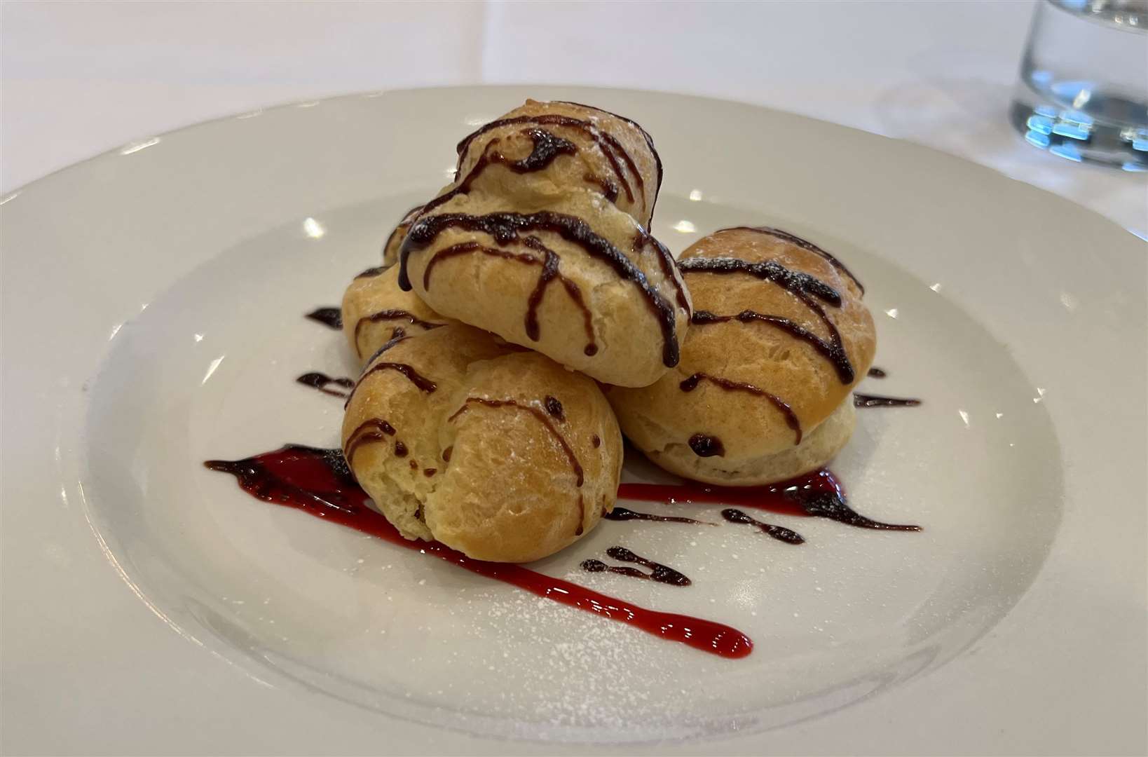 Profiteroles - hard to resist and that drizzle of raspberry was well judged