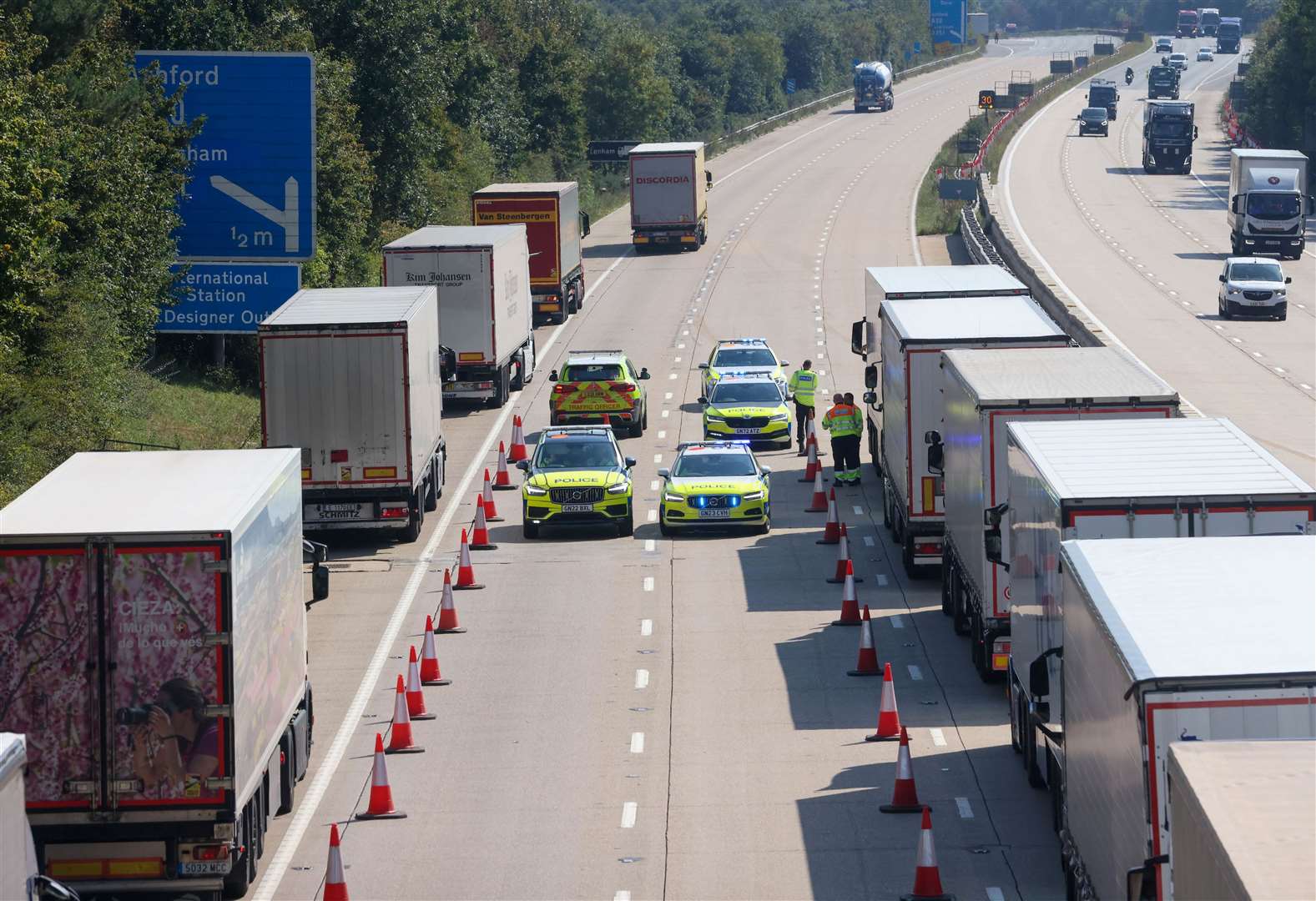 Police holding lorries on the M20 on the approach to Ashford. Picture: UKNIP