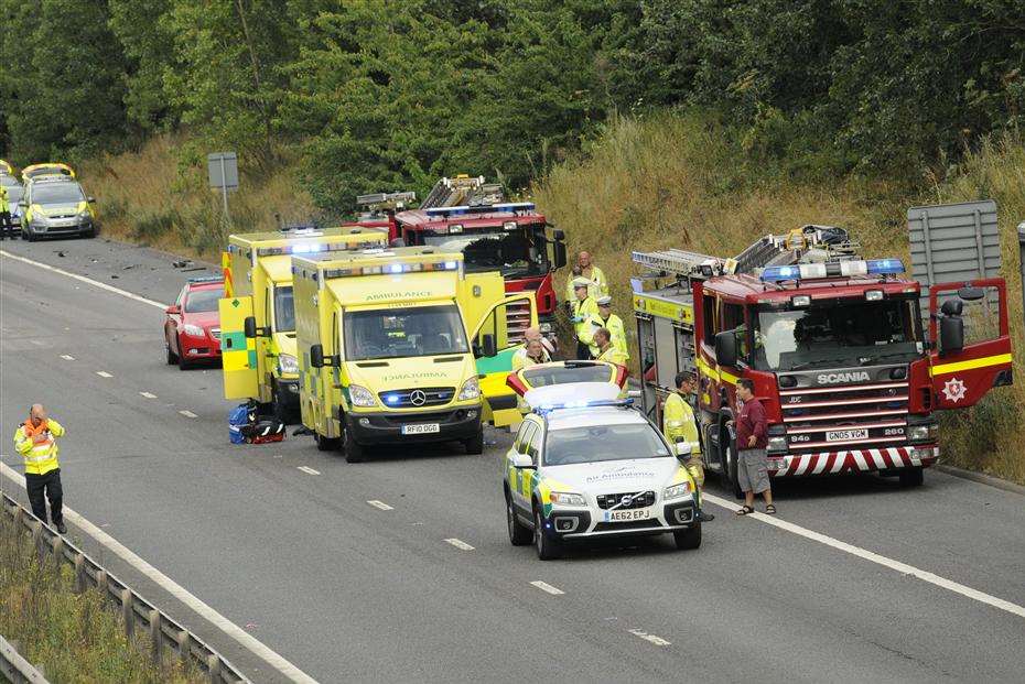 Rescue crews at the scene of the motorway crash today