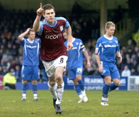 James Milner celebrates scoring his second of the game from the spot.