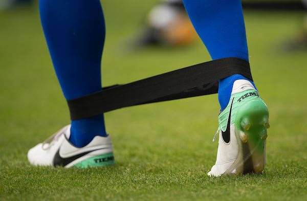 Gillingham player warms up with stretch bands Picture: Ady Kerry