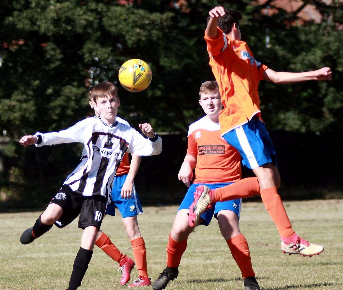 Milton & Fulston (stripes) and Cuxton 91 clashed in Under-15 Division 1 Picture: Phil Lee
