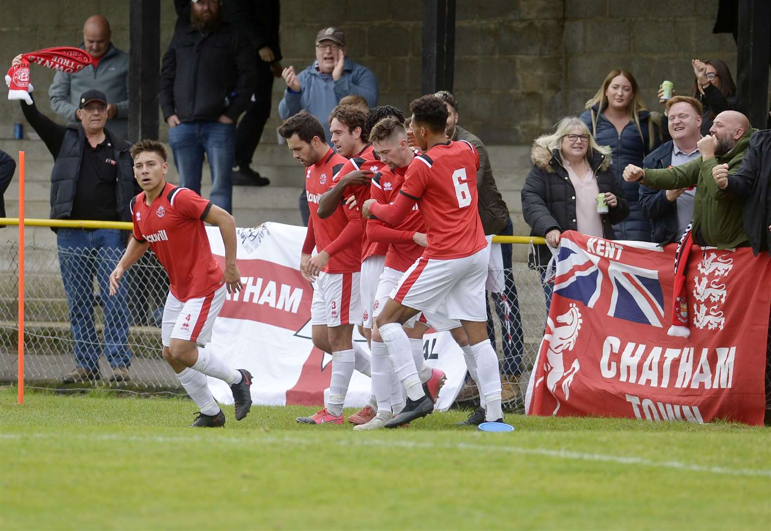 Chatham players and fans celebrate Dan Bradshaw's opener at Folkestone Picture: Barry Goodwin