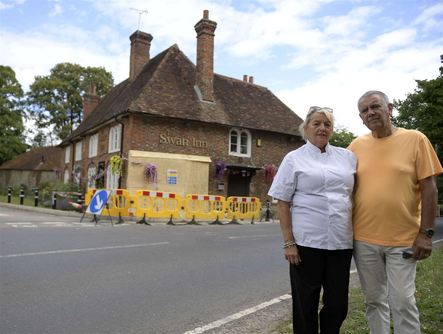 Ann and Ray Perkins outside their pub before work on the mural started. Picture: Barry Goodwin
