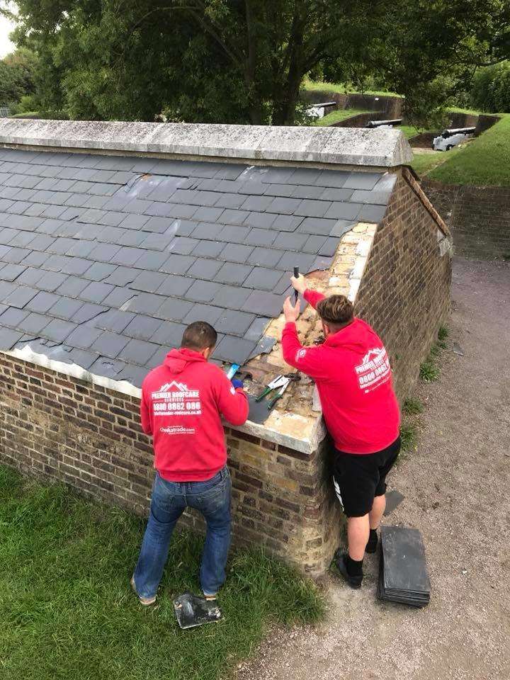 Two of the roofers from Premier roof-care fixing Fort Amherst on Sunday, August, 26 (3843986)