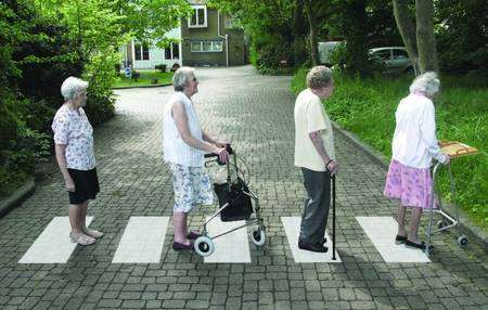 Abbeyfield residents with their version of the Beatles' Abbey Road album cover