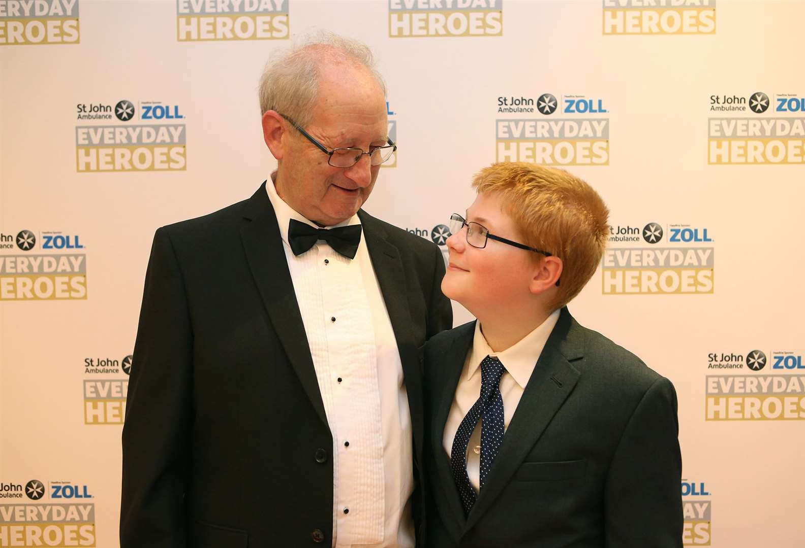 Logan got an award for his actions, he is pictured at the ceremony with Mr Walsh. Photograph: Johnny Green