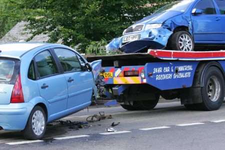 Two cars involved in a collision on the A28 are removed