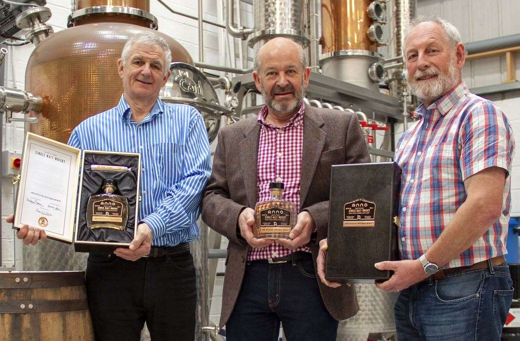 Founders Andy and Norman with Robert Wicks from Westerham Brewery. Picture: Rob Cursons