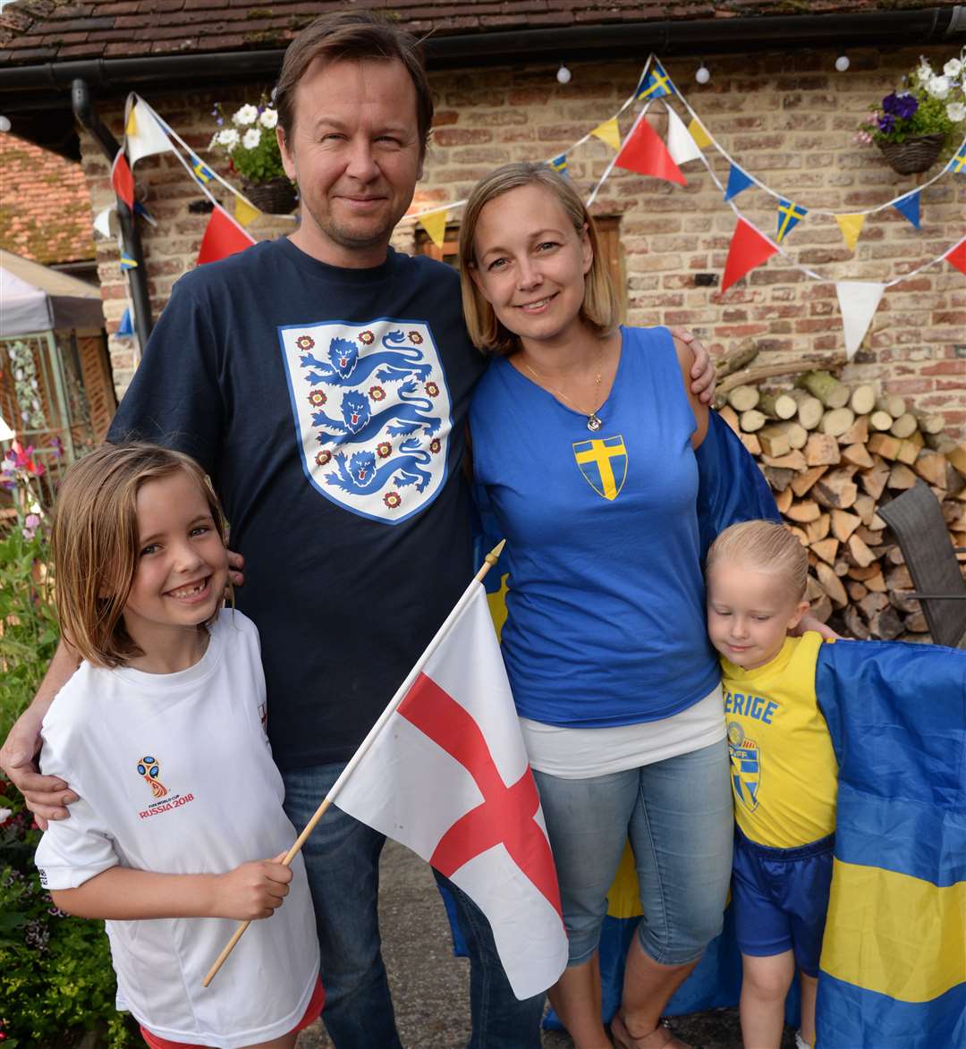 Mike Abbott and his Swedish partner Anna Svensson and their children Alice, nine, and Ellen, six, at the Yew Tree