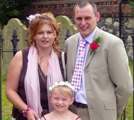 TRAGEDY: Rachel Cheesewright pictured with her partner Lewis Whitehead and their daughter Charlotte at a wedding in July