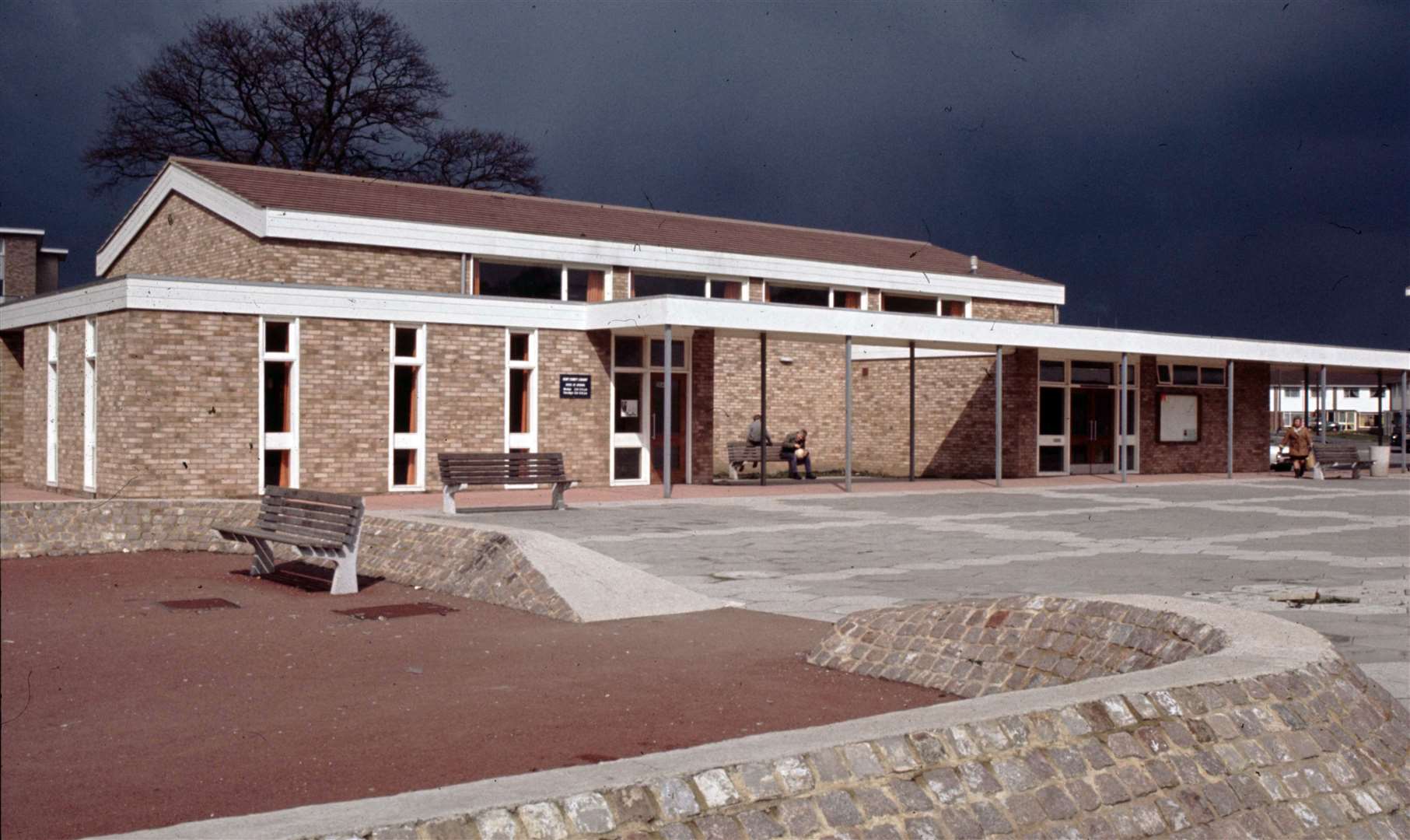 The bright and fresh Bockhanger Community Centre stands out against an angry sky during its early days of existence, pictured in 1970. Picture: Steve Salter