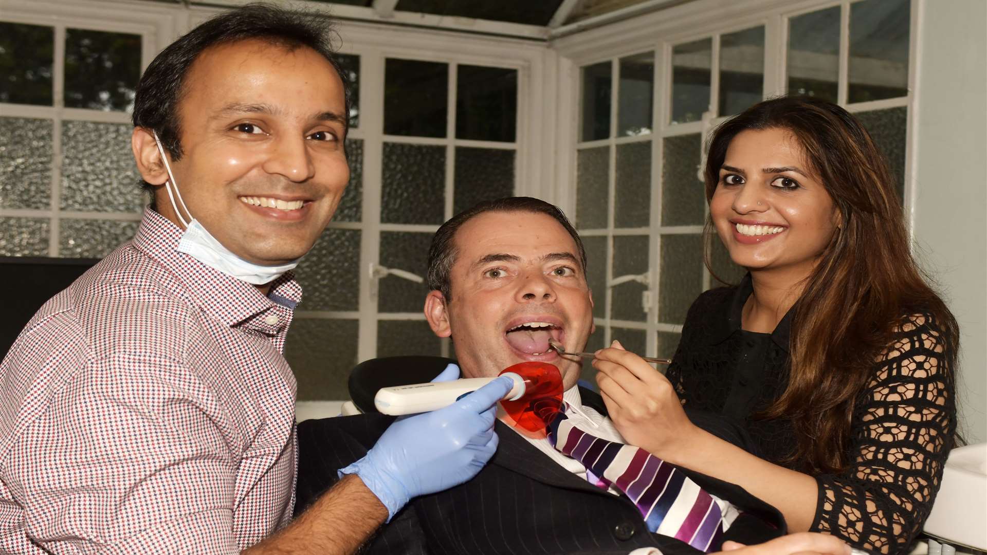 From left, Dr Balal Afzal of Park Road Dental, Paul Barnes of Royal Bank of Scotland and Sarah Nazir of Park Road Dental