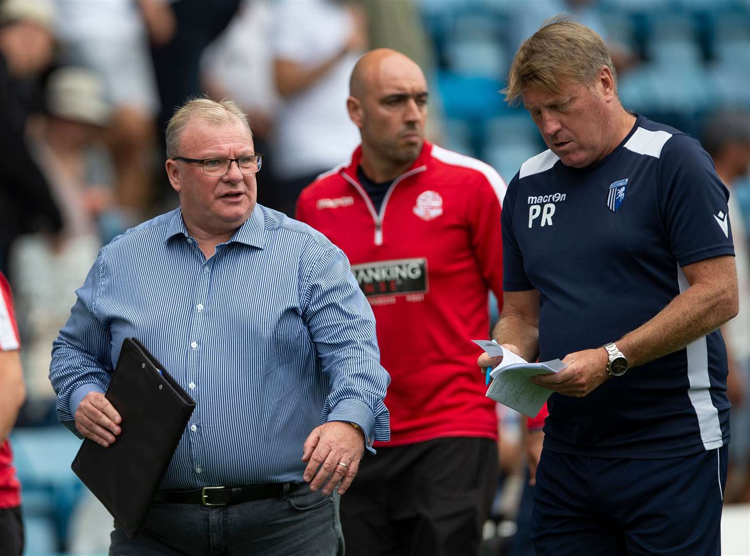 Gillingham manager Steve Evans and assistant Paul Raynor are keeping tabs on the non-league scene