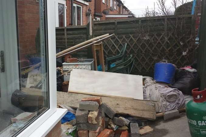 With rubbish dumped in a garden by builders, this view is one of the finalists