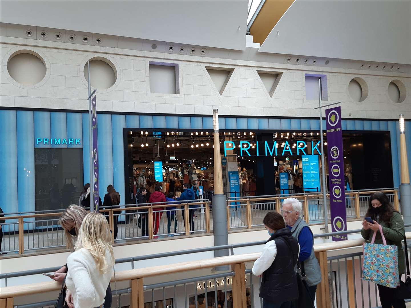 Shoppers queue outside Bluewater