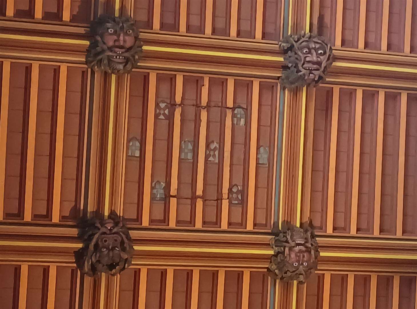 The Green Men carved into the ceiling in The Crossing