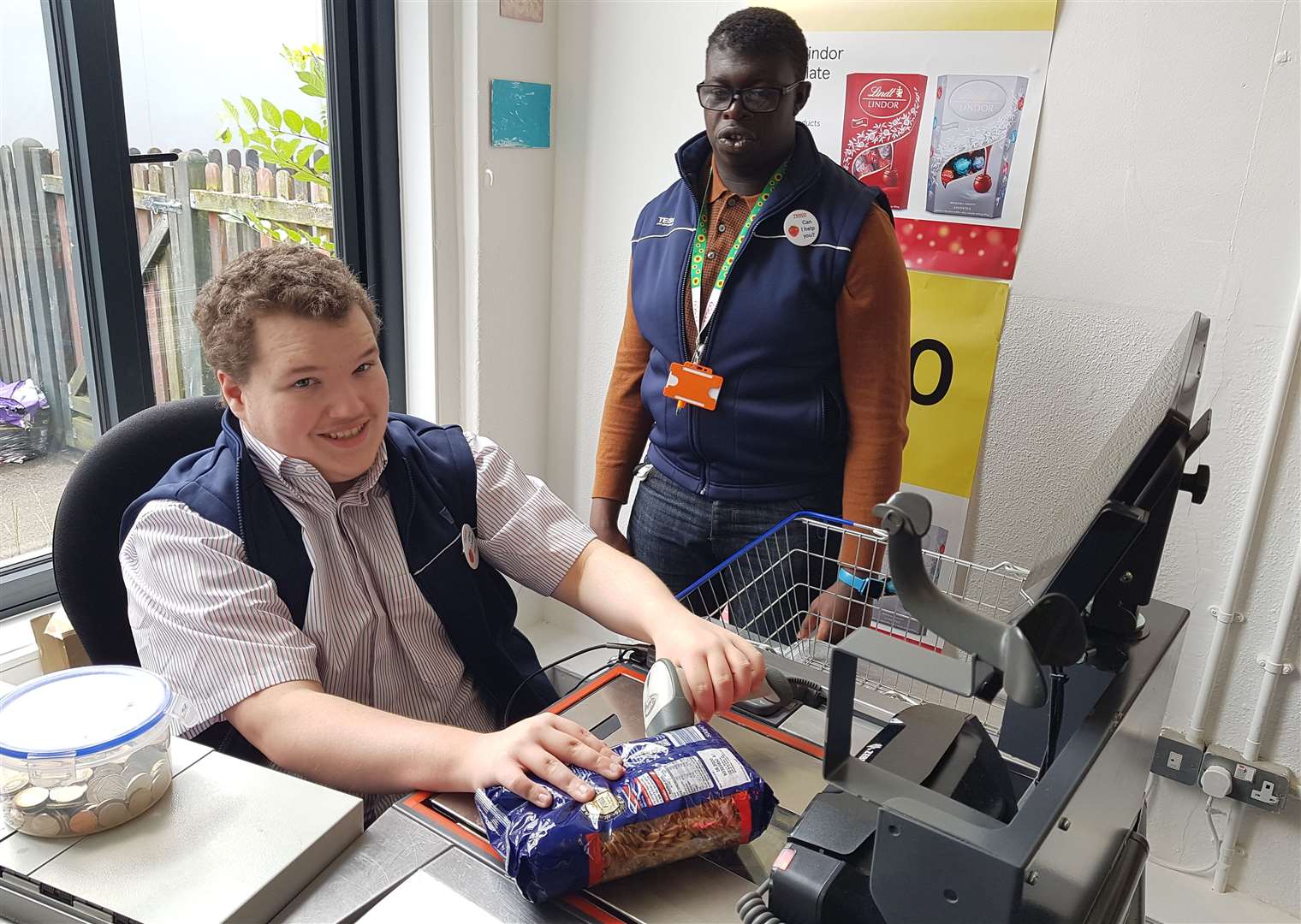 Daniel and Taio work in the new Tesco store