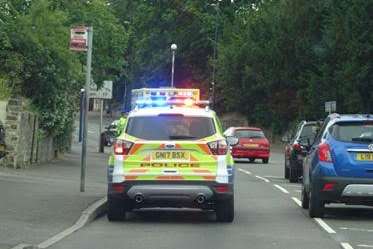 Several police cars were at the scene. Picture: Owen Harfleet