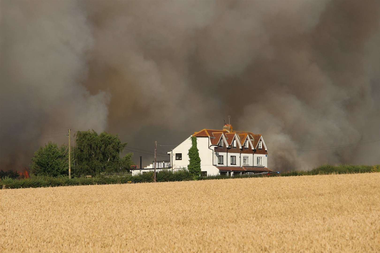 Neighbours reported being evacuated from nearby properties while fire crews tackled the blaze. Photo: Paul Aspinall