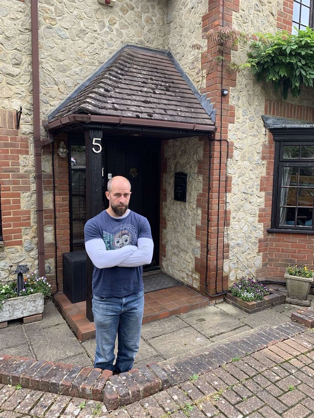 A disgruntled Mark Tolladay outside his home in Hall Road
