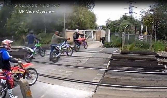 A group of bikers cut off a padlock to cross this level crossing in Shornemead, near Gravesend