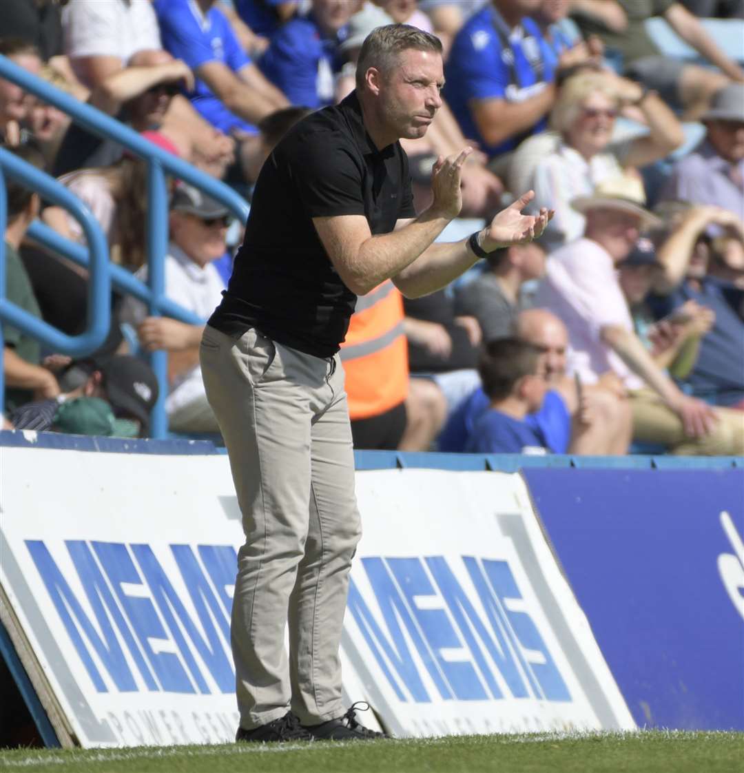 Gills boss Neil Harris encourages his side. Picture: Barry Goodwin