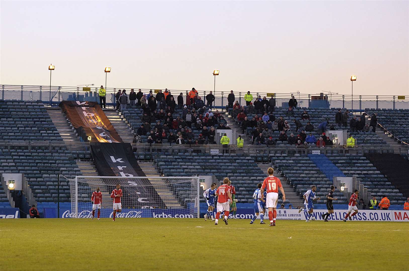 Away fans brave the almost freezing conditions in a game at Gillingham Picture: Barry Goodwin