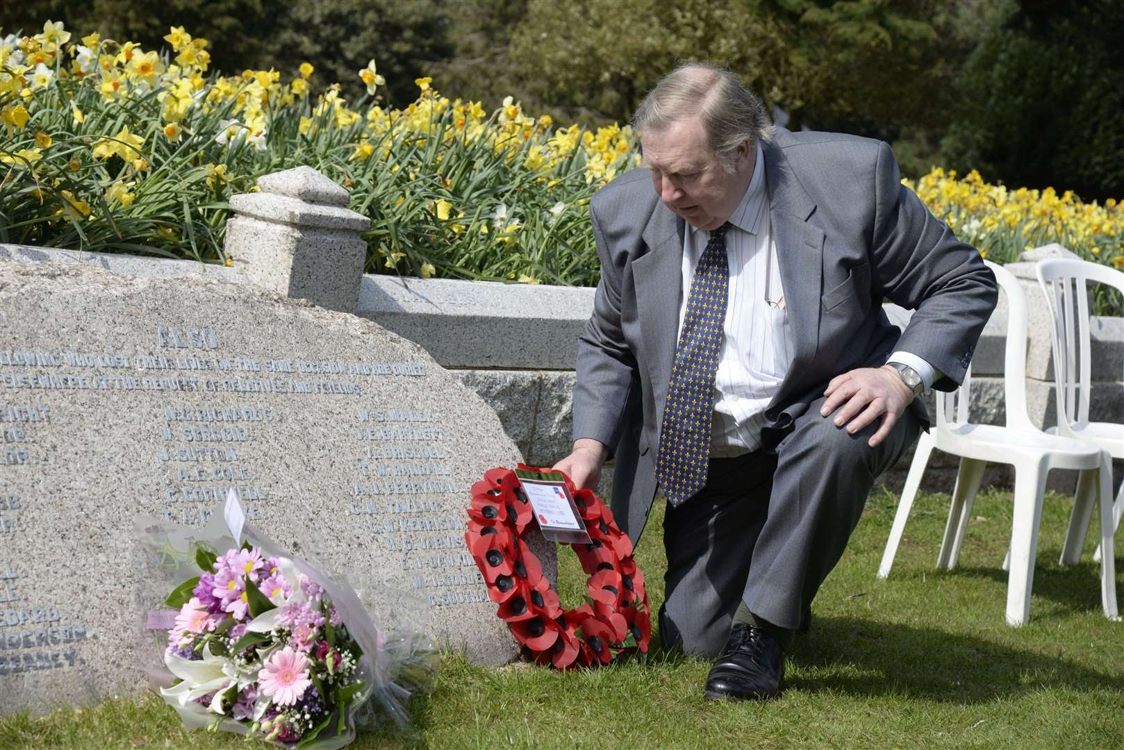 Len Budd of the Chilham Remembrance Group lays a wreath at the 100th anniversary service in memory of the three men from the village killed in the Great Explosion